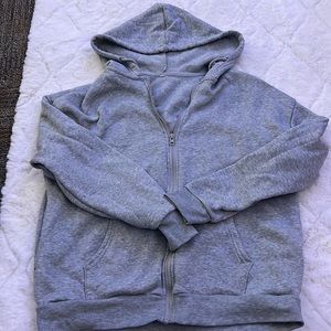 Lightly worn grey zip op hoodie, size large